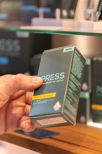 A customer browsing a cannabis dispensary