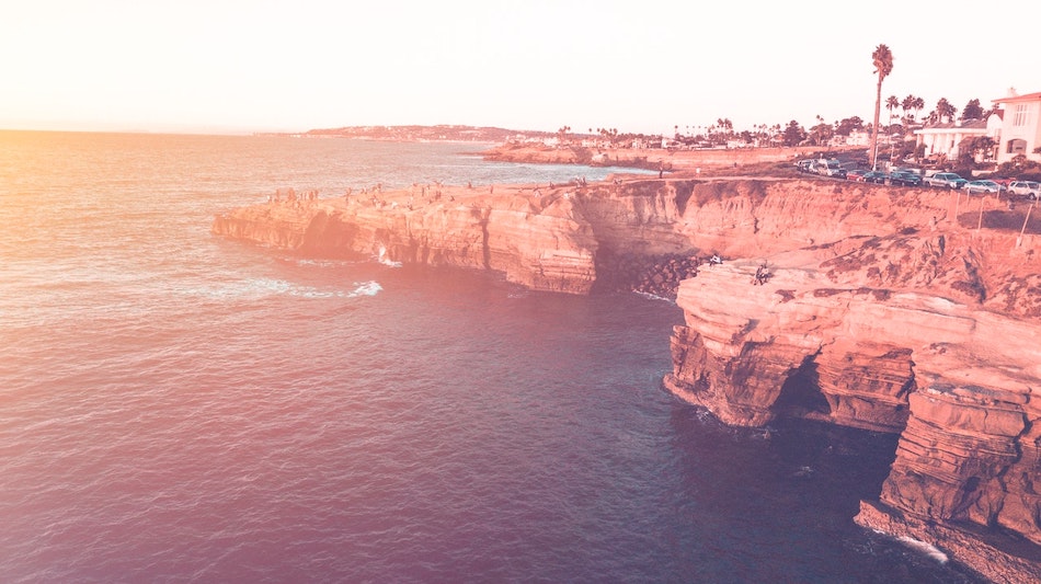 People are out during the Orange Tier on Sunset Cliffs