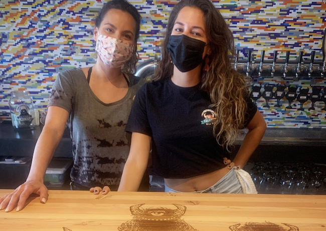 Bartenders wearing masks in San Diego