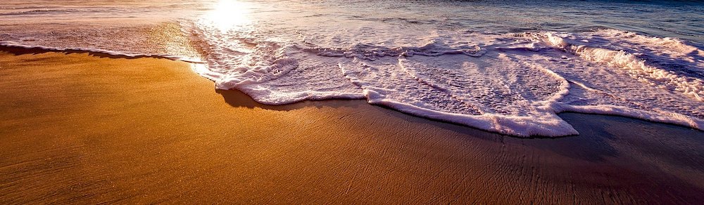 Beach sand, which does actually exfoliate skin