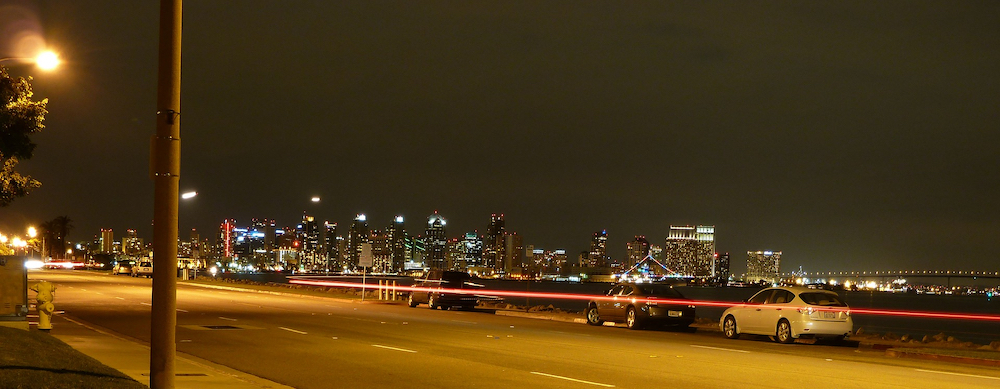 Cars on a street in San Diego at night