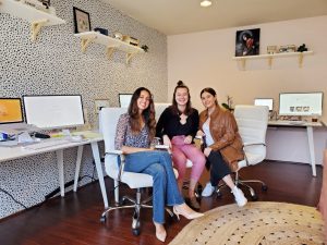 Joline Mann and the Purposer.com team, the first ethical e-commerce marketplace, sitting in their iconic polka dot office.